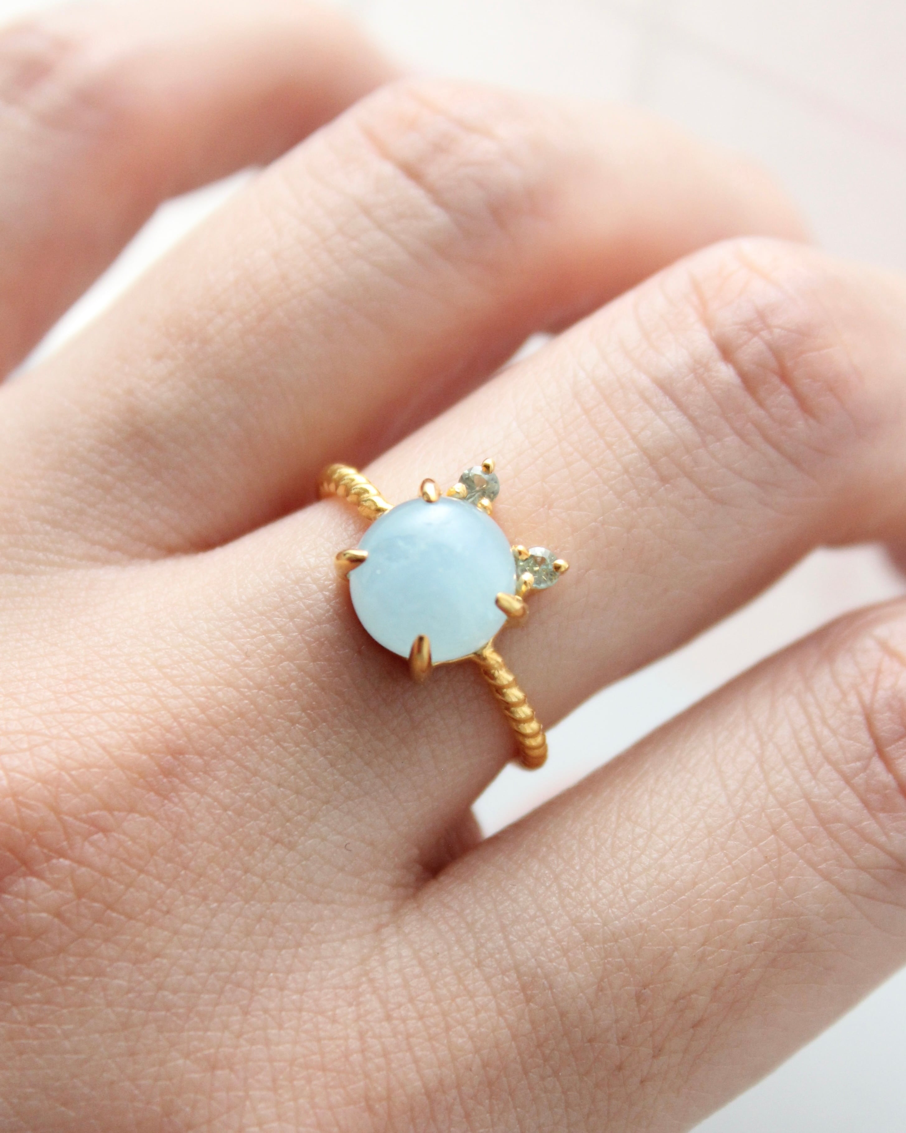 Twist ring “CAT” シャトンブルークレール
